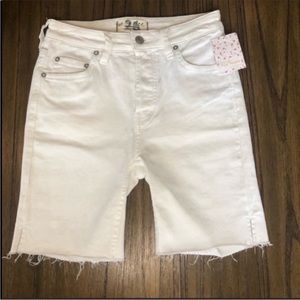 We The Free high rise cutoff mid length white denim shorts